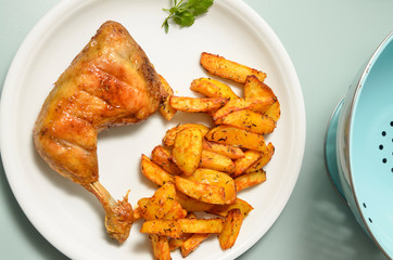 Roasted chicken with potato wedges