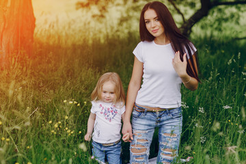 Fototapeta premium child near tree with mom