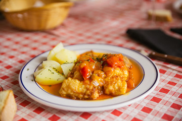 Dish of fish with potatoes