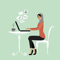 Muslim Office worker or arabic business woman. Working On laptop