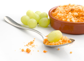 earthenware with crumbs with fresh grapes rural Spanish stew