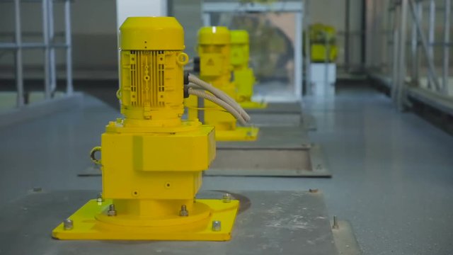 Water Treatment. Yellow Objects. Industrial Pump For Water