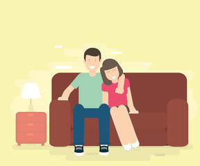 couple sitting on sofa. man and woman enjoy