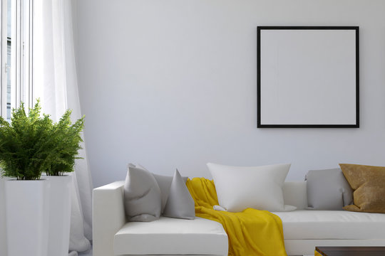 Living room scene with blank picture frame