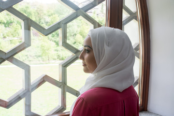 Fototapeta premium Young muslim woman in mosque