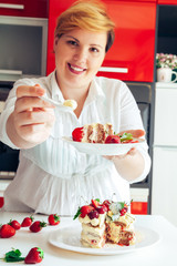 Woman Holding A Plate With A Piece Of The Naked Cake