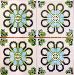 Detail of the traditional tiles from facade of old house in Valencia, Spain