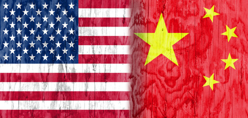 Fototapeta premium Image relative to politic relationships between United States and China. National flags textured by wood