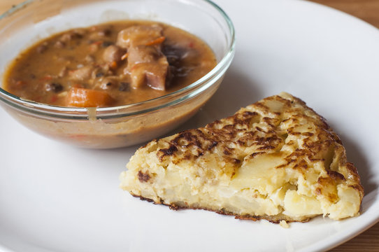 Spanish tapas: red beans stew and spanish tortilla.