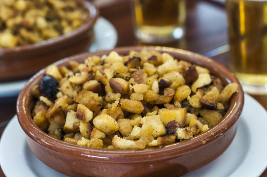 Spanish "migas". Authentic spanish tapa served in traditional restaurants in Madrid.