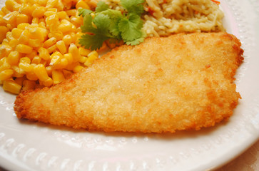 Breaded Baked Fish Served with Corn & Rice