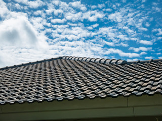 blue sky with cloud over the house roof