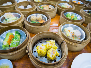 various dim sum in bamboo steamer