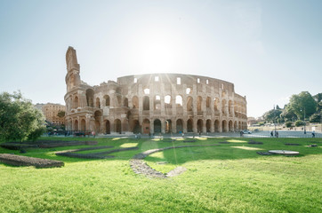 Colosseum in Rome and morning sun, Italy