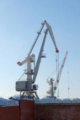 Cargo cranes in the Astrakhan River Port, Russia.