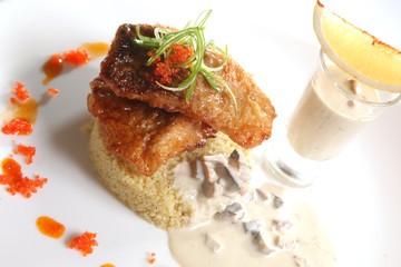 Fried CARP with garnish and mushroom sauce