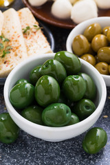 green olives and soft cheeses, vertical, top view