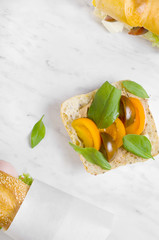 Various sandwiches on marble table