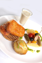 Grilled Pike cutlets with garnish and sauce