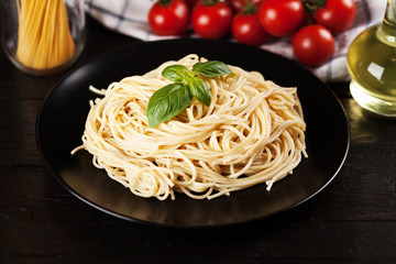 Spaghetti bolognese on dark background