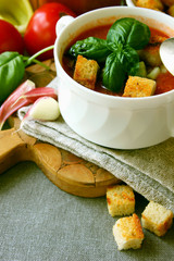 A plate of gazpacho with croutons..