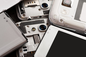 Disassembled cell phone with visible parts inside
