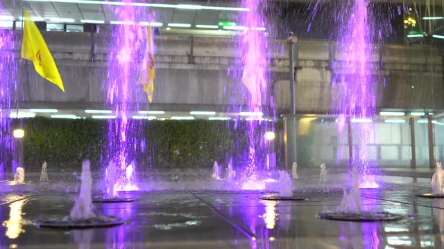 Fountain on the skyscraper. middle focuses selectively and uses curve camera dolly slowly&nbsp;