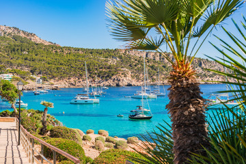 Idyllic view of anchoring boats in the bay of Sant Elm Majorca Spain