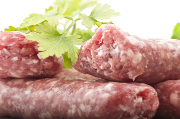 sausage with parsley leaves on the white
