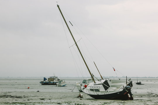 Boats in mudflats