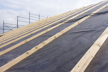 construction works of construction and insulation of a roof