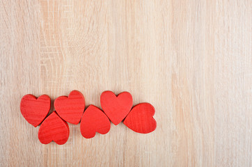 Heart on wooden background