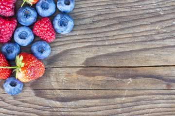 close-up of berries on a wooden background
