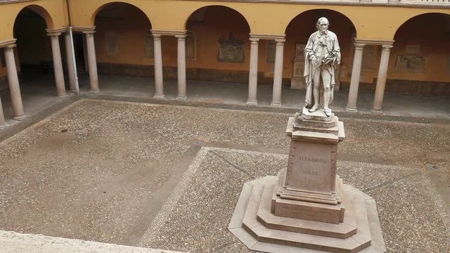 Alessandro Volta statue at University of Pavia, PV, Italy, slow panoramic shot
