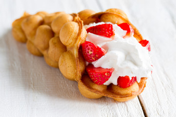 waffles with strawberries and whipped cream