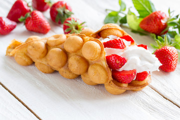 waffles with strawberries and whipped cream