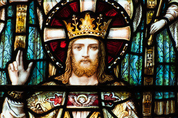 Deatil of Stained glass in Winchester Cathedral, portraying Jesus Christ