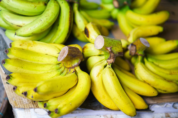 Asian street farmer market selling bunch of bananas in Vietnam