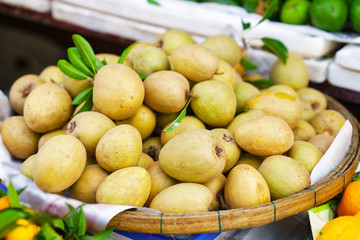 Asian street farmer market selling fresh fruit in Vietnam