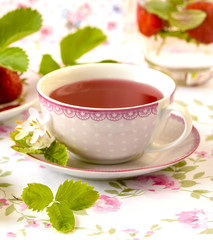 Fruits tea served with strawberry