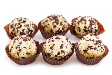 Obraz premium Homemade vegetarian truffle candies isolated on white background