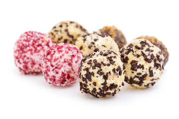 Homemade vegetarian truffle candies isolated on white background