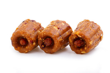 Delicious candies anthill isolated on white background.