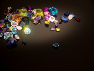 Jewel on black shine color, Collection of many different natural gemstones 
amethyst, lapis...