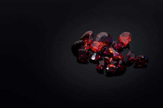 Red Ruby on black shine table, 