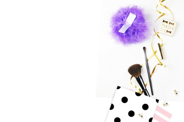 Modern woman desk. Make up cosmetics, brushes and lipstick on white background top view. Gold stationery. Mock-up. Feminine scene. header site or hero site. Flat lay image.