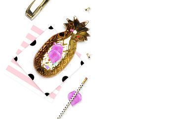 Styled background. Mock-up photo. Fashion and trendy. Flat lay. Stationery items, polka dots pattern with pineapple and pencil, gold stapler. Header for site, hero