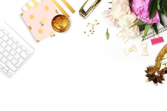 Flat lay. Flower on the table. Keyboard and stapler. Table view. Business accessories. Mock-up background. Peonies