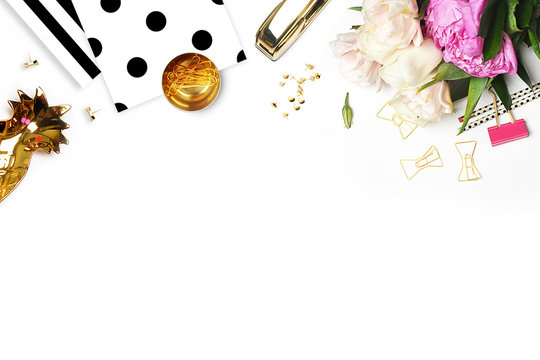 Flat lay. Flower on the table. Gold pineapple.Table view. Mock-up background. Peonies flower. Polka dots pattern. Mockup product view table gold accessories. stationery supplies. glamour style.
