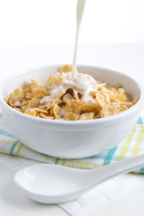 cornflacks with milk served for breakfast with splash